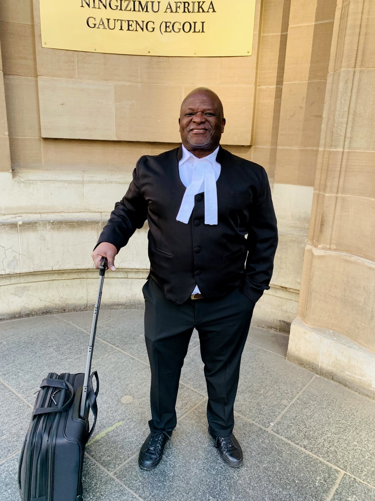 Adv Sipho Dlamini in robes outside the High Court, Gauteng Division